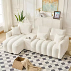 Canapé d'angle en tissu Teddy 234 cm avec console centrale, ports USB et table basse - Blanc